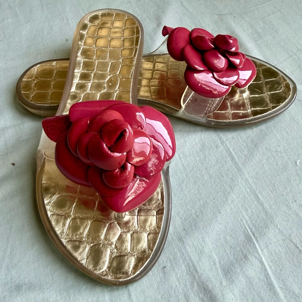 Stewart Weitzman Clear Sandals with Patent Leather Flower